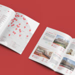 Deux magazines Orpi Val-de-Marne ouverts sur fond rouge